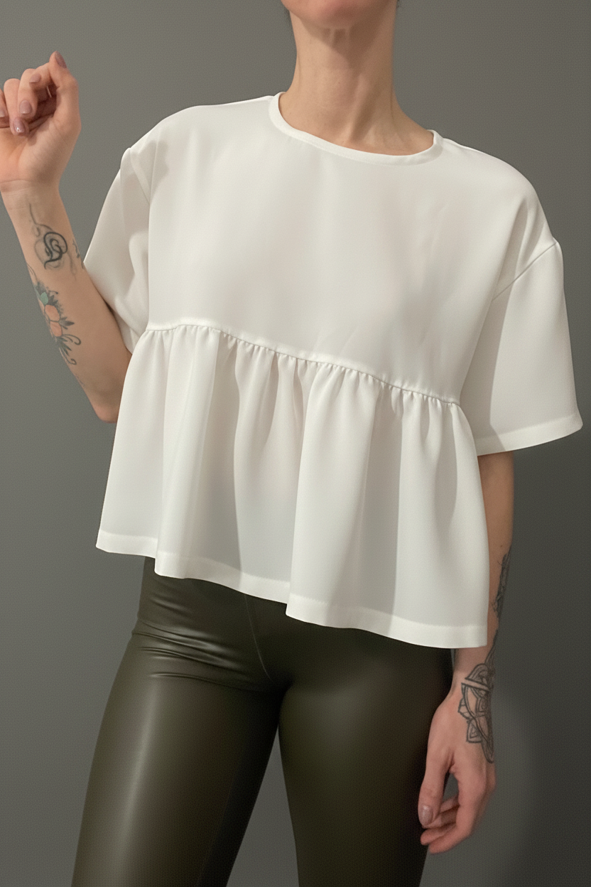 Blusa peplum frontale braccio alzato – tessuto liscio