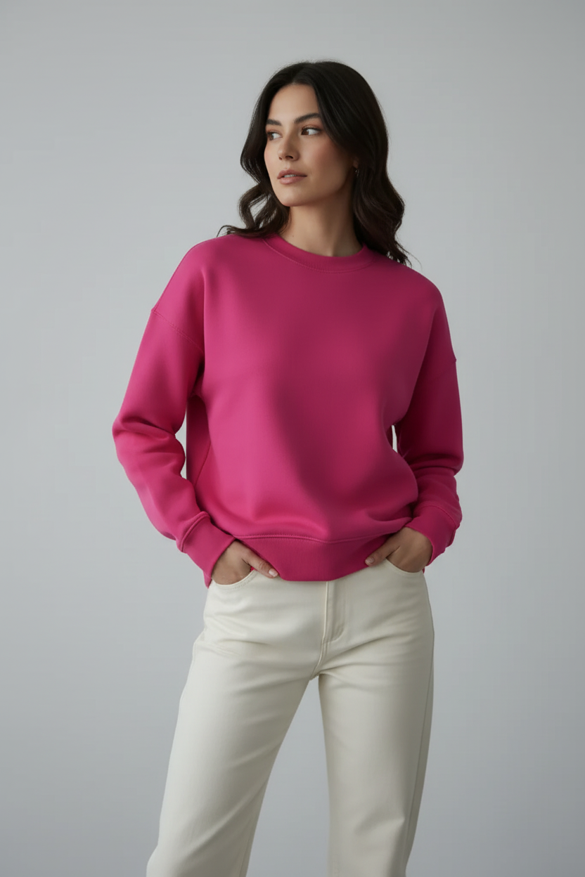 Felpa rosa con posa diversa