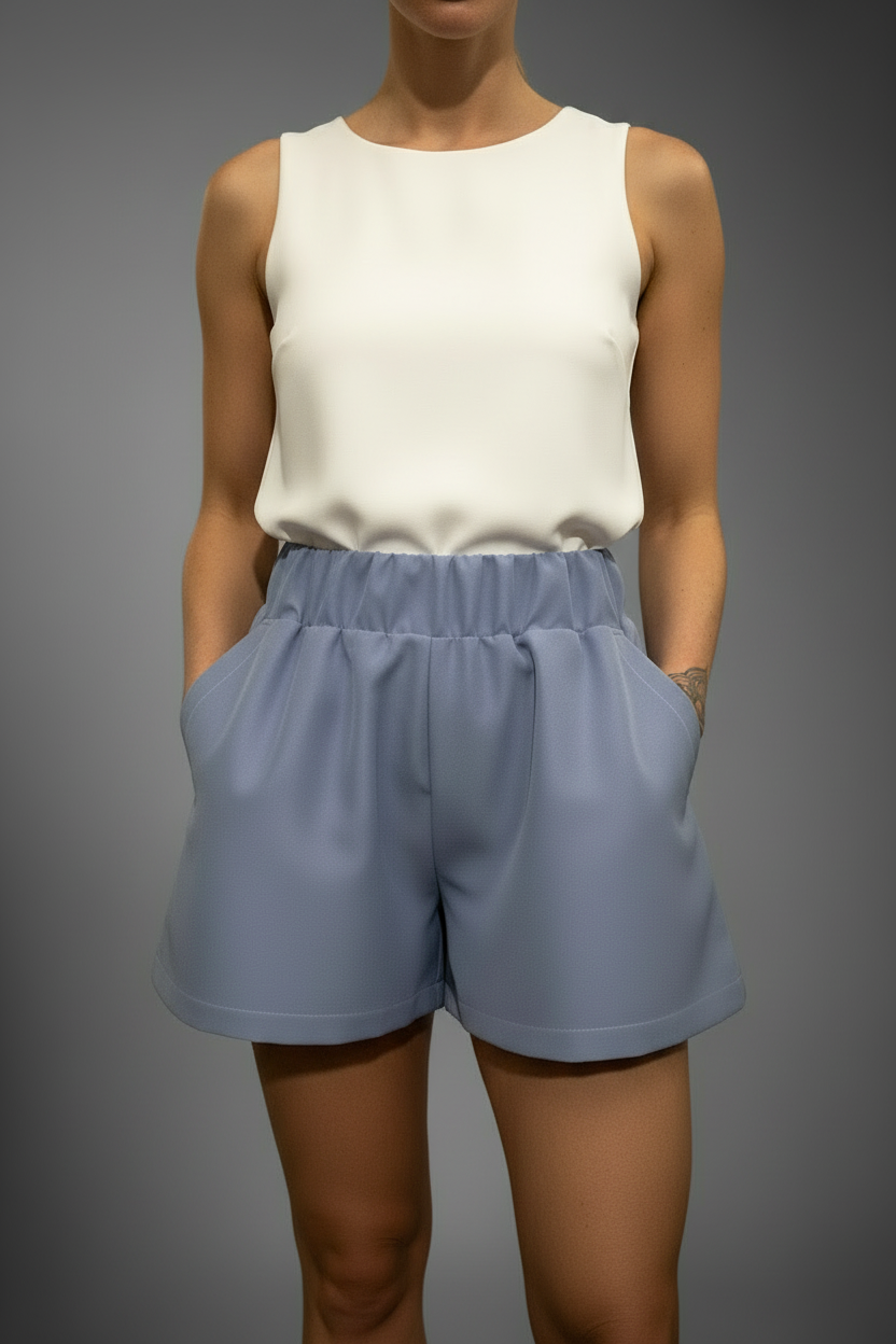 Top bianco + short a campana frontale